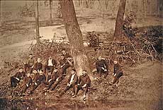 American cycle club group resting by river - one tricycle in group