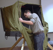 Blake and his custom portable darkroom - photo by Ed Warner