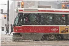 From Storm 2011 on dfable.com - A TTC "Red Rocket" plunging on in a snow storm