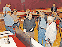 Talking with Will Mokrynski (dark shirt, centre)